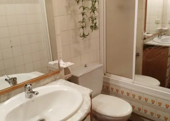 Venta de piso de cuatro dormitorios en planta baja con garaje en Manzanares